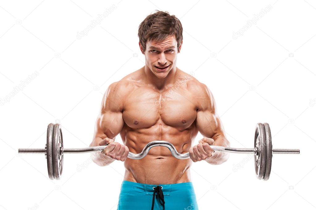 Muscular bodybuilder guy doing exercises with dumbbells over whi