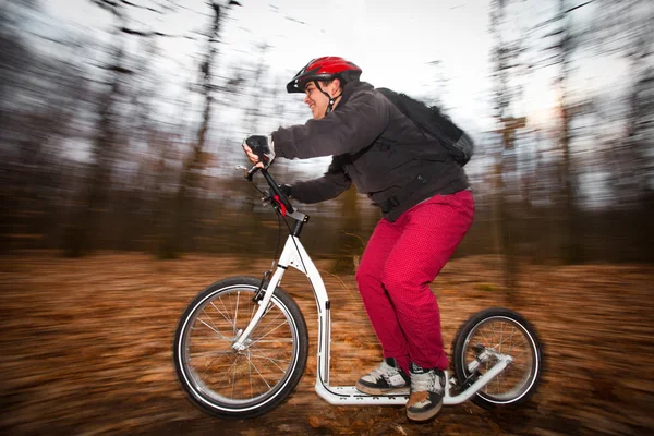 Homem em scooter — Fotografia de Stock