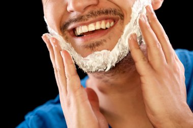 Man with shaving foam