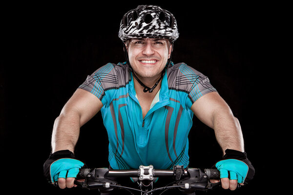 Young Male Cyclist With His Bicycle