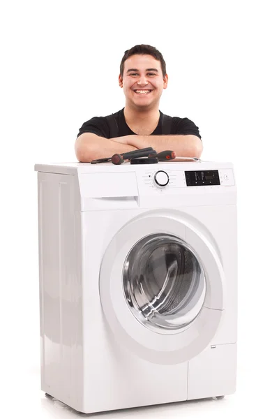 Ремонтник стиральной машины — стоковое фото