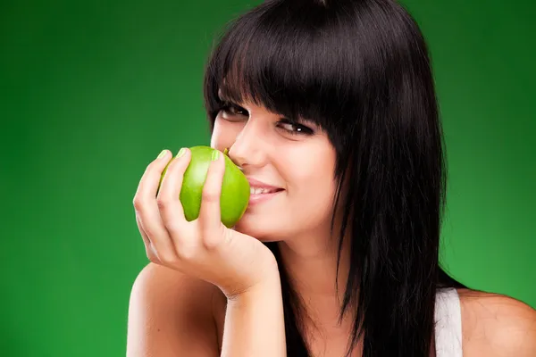 Woman with green apple — Stock Photo, Image