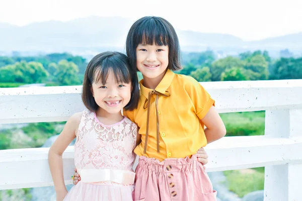 Two Beautiful Black Haired Girls Smiling Asians Thin Summer Hoodies — Stock Photo, Image