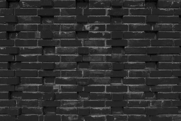 黑墙的质地用了很多砖 或带有抽象装饰图案的黑色砖墙 — 图库照片