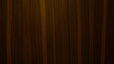 Arkaplan yapısı kahverengi damarlı yumuşakçadır..