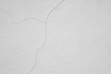 Duvar kağıdı reklam arkaplanı için hasarlı beyaz çimento duvar arkaplanı.
