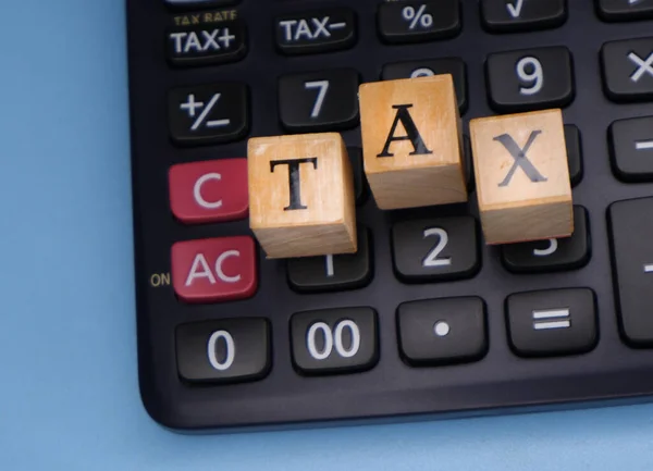 Tax Letters Wooden Beads Block Calculating Tax Calculator — Stock Photo, Image