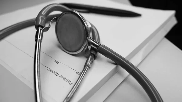 Healthcare concept with Stethoscope, prescription pad and pen.