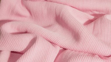 Dokulu çizgili pembe kumaş. Kırışık kumaş..