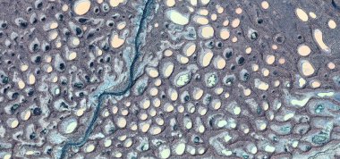 Döllenmiş yumurtalar, Afrika çöllerinin havadan soyut fotoğrafları. Çöl manzaralarının havadan görünüşü, Tür: Soyut doğalcılık, soyuttan mecazlara