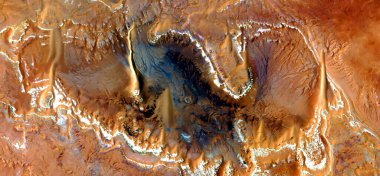 the burned skin of the Earth,  abstract photographs of the deserts of Africa from the air,