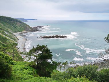 photography of the route of the viewpoints that goes from the beach of Aguilar to the viewpoint of the Holy Spirit, in San Esteban de Naln, Asturias, Spain, tourist destination,