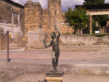 Ruins of the House of the dancing Faun in the once buried city of Pompeii Italy clipart