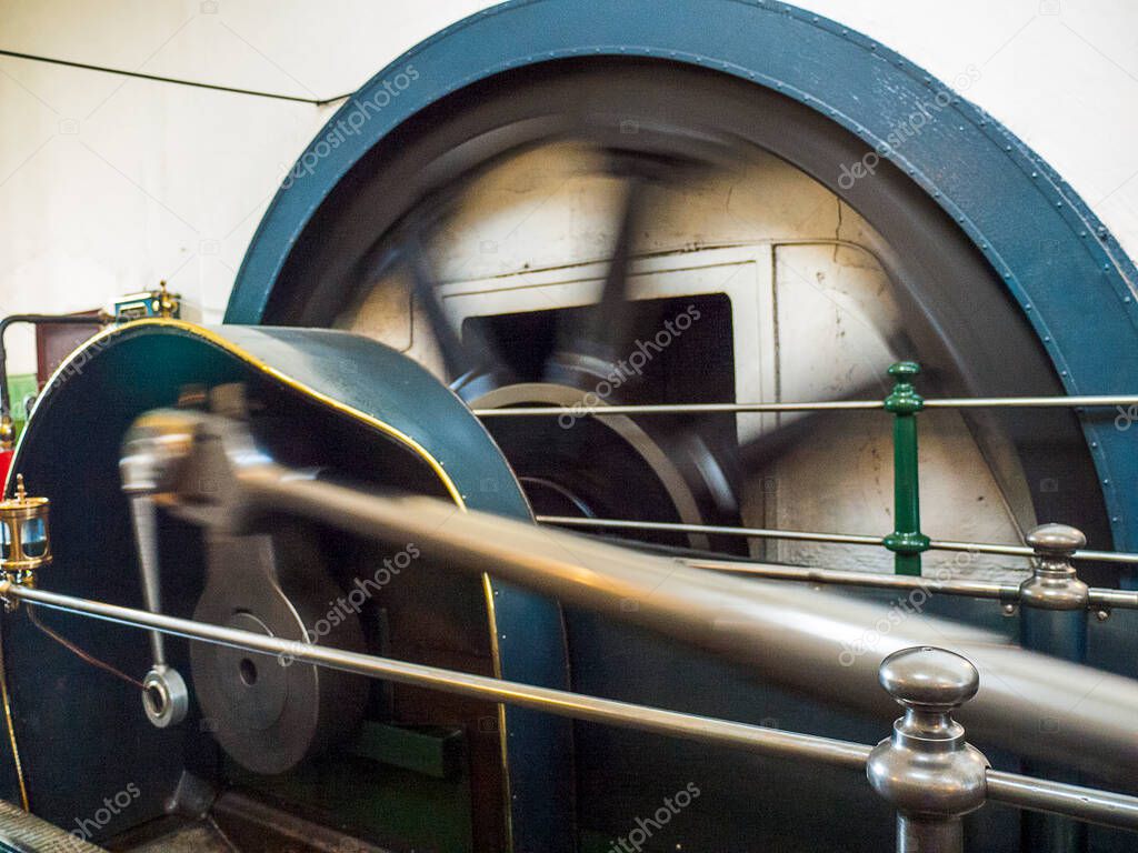 Steam engine,flywheel and Weaving Looms.These powered the Cotton Mills that made Burnley one of the worlds largest  largest producers of Cotton Cloth