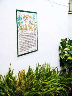 Bu, 1569 'da Alpujarra Dağları' ndaki Frigiliana savaşını anlatan fayanslı bir plaket. Hristiyanlar ve Berberiler savaştı ama mağlup oldular. Bu yüzden bütün çocukları ceza olarak onlardan alındı. Asla ailelerine dönmeyecekler.