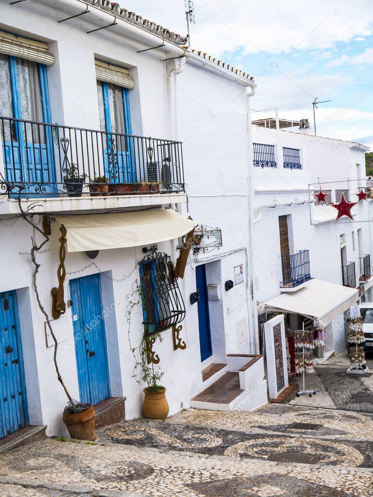 Frigiliana is one of the most beautiful white villages of the Southern Spain area of Andalucia in the Alpujarra mountains. The steep narrow streets are picturesque and climbing the steep streets in the old Town is a challenge.Flowers bloom everywhere