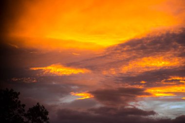 This spectacular sunset was in September  in Burnley in Lancashire in Northern England. This image was not manipulatied to enhance the colour  and it was totally natural 
