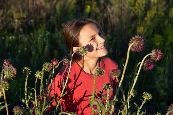 Smiling Girl Red Blouse Summer Field Thistle Flowers Concept Summer — стоковое фото