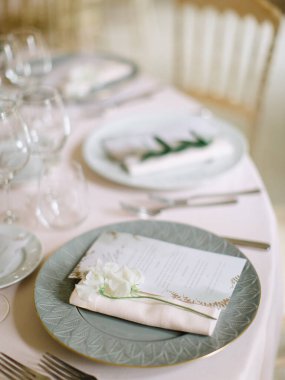 wedding decor, served tables, ivory, with candles, glasses, beautiful wooden tables, inside the Italian old Villa