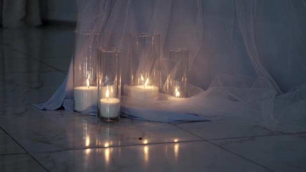 Decorative White Bulk Candles Wicks Transparent Glass Flasks Candlesticks Floor — Stockvideo