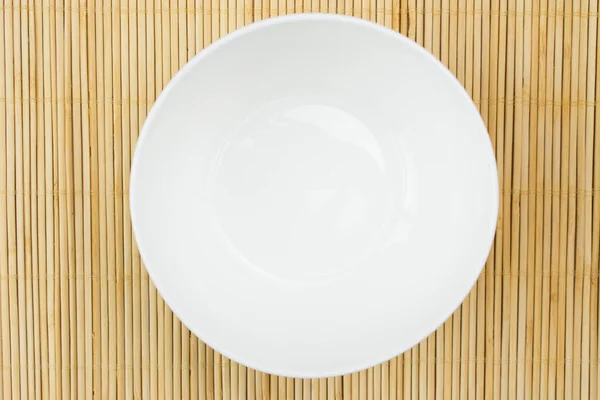 White Empty Bowl Bamboo Mat — Stock Photo, Image