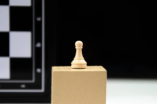 Chess Piece Pawn Stands Podium Background Chessboard Squares Leadership Victory — 图库照片