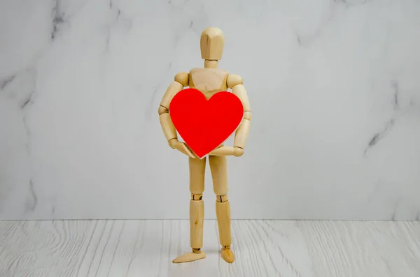 Wooden Figurine Man Big Red Heart His Hands Concept Love — Φωτογραφία Αρχείου