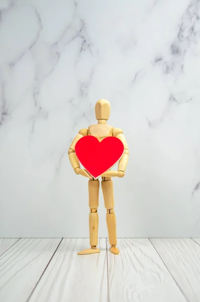 Wooden Figurine Man Big Red Heart His Hands Concept Love — Stok fotoğraf