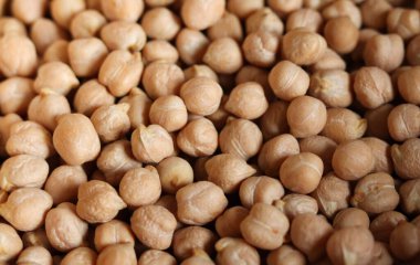 Nohut arkaplanı, üst manzara. Nohut tohumları arka planı, yakın plan. Nohut yakın çekim, üst manzara. Nohut çekirdeği, arka plan..