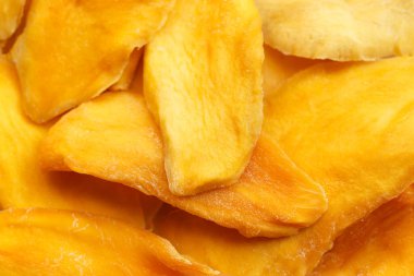 Arka plan olarak kurumuş mango yığını. Boşluğu kopyala, kapat.