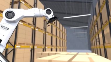 Robot kolu depodaki karton kutuyu topluyor, otomatik robot kolu depoda.  