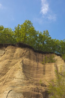 Kumdan duvar, kum kayalığı. Yüksek kalite fotoğraf. Yüksek kalite fotoğraf