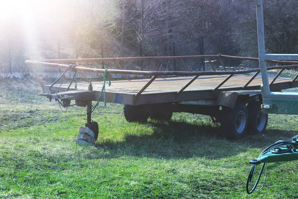 Tractor trailer on animal farm.Spring season. High quality photo