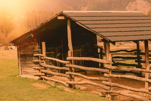 Wooden shelter on animal farm.Spring season. High quality photo