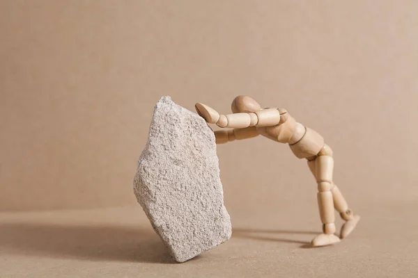 Business Concept Wooden Man Pushing Large Stone — Stockfoto