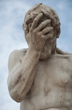 Statue in Tuileries garden in Paris