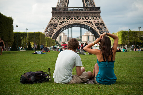 Couple in Eiffel Tower in Paris