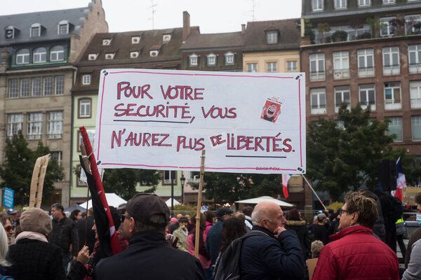 Strasbourg - France - 2 October 2021 - man protesting with banner in french : pour votre securite, vous n'aurez plus de liberte, in english : for your safety, you will no longer have any freedom