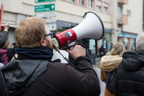 Colmar - France - 13 November 2021 -  people protesting against the sanitary pass with megaphone