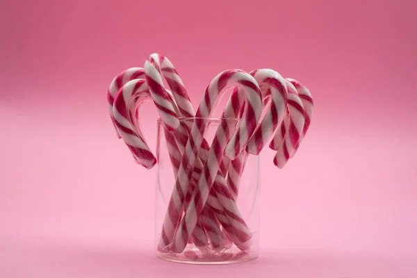 Closeup Red White Stripped Candy Cane Pink Background — Stock Photo, Image