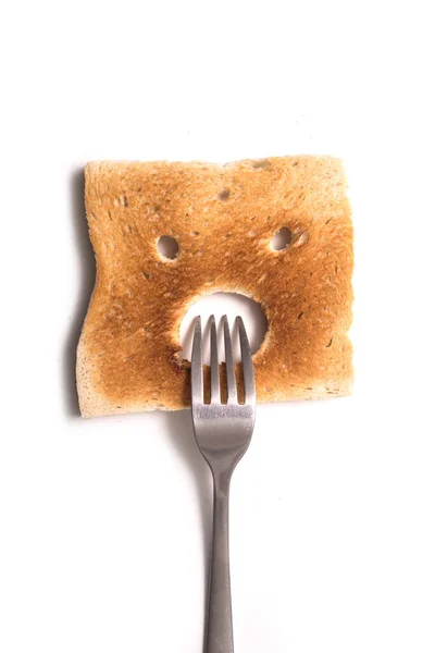 Closeup Expressive Toasted Slices Bread Fork Mouth White Backgroundnd — Fotografia de Stock