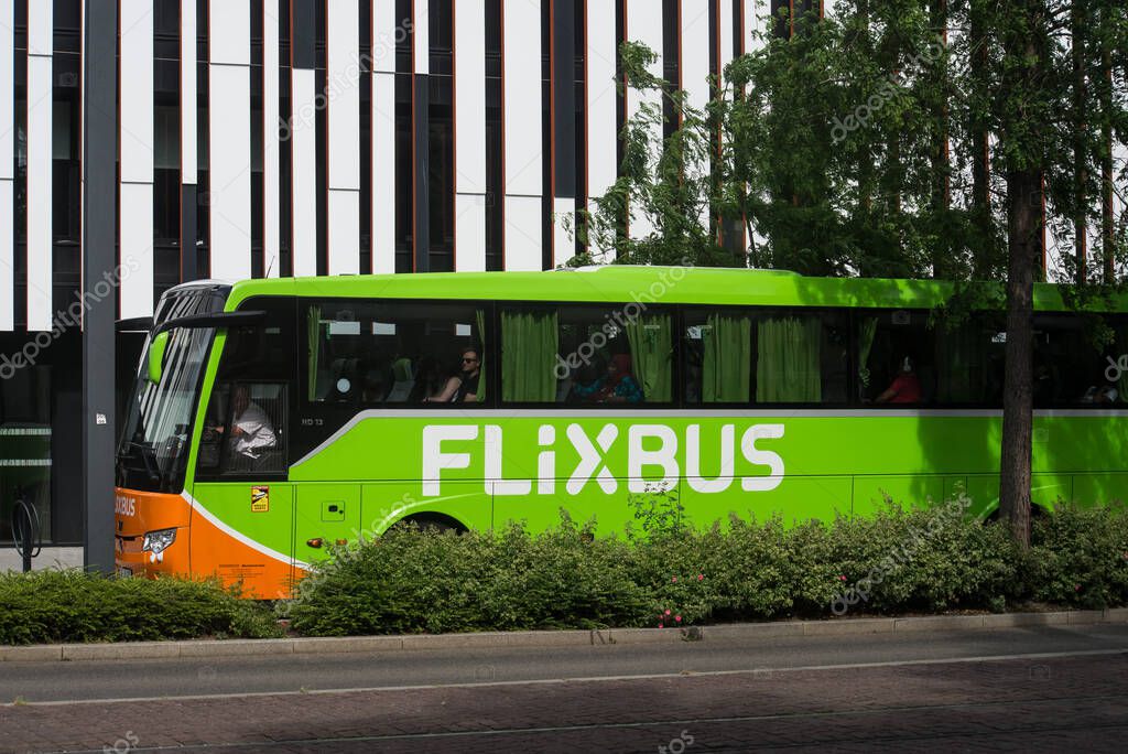 Mulhouse - France - 23 May 2022 - View of green flixbus in the street, flixbus is the famous intercity travel company