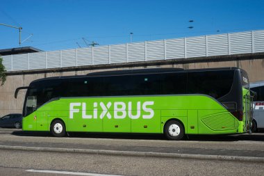 Kehl - Germany - 2 july 2022 - View of green flixbus in rton of the train station in the street, flixbus is the famous intercity travel company 