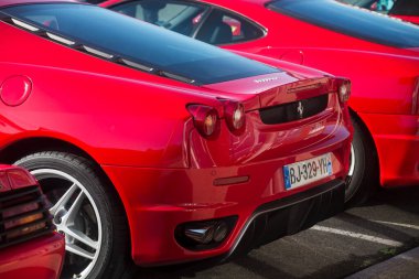 Lutterbach - France - 4 September 2022 - Rear view of red ferrari F430 parked in the street 