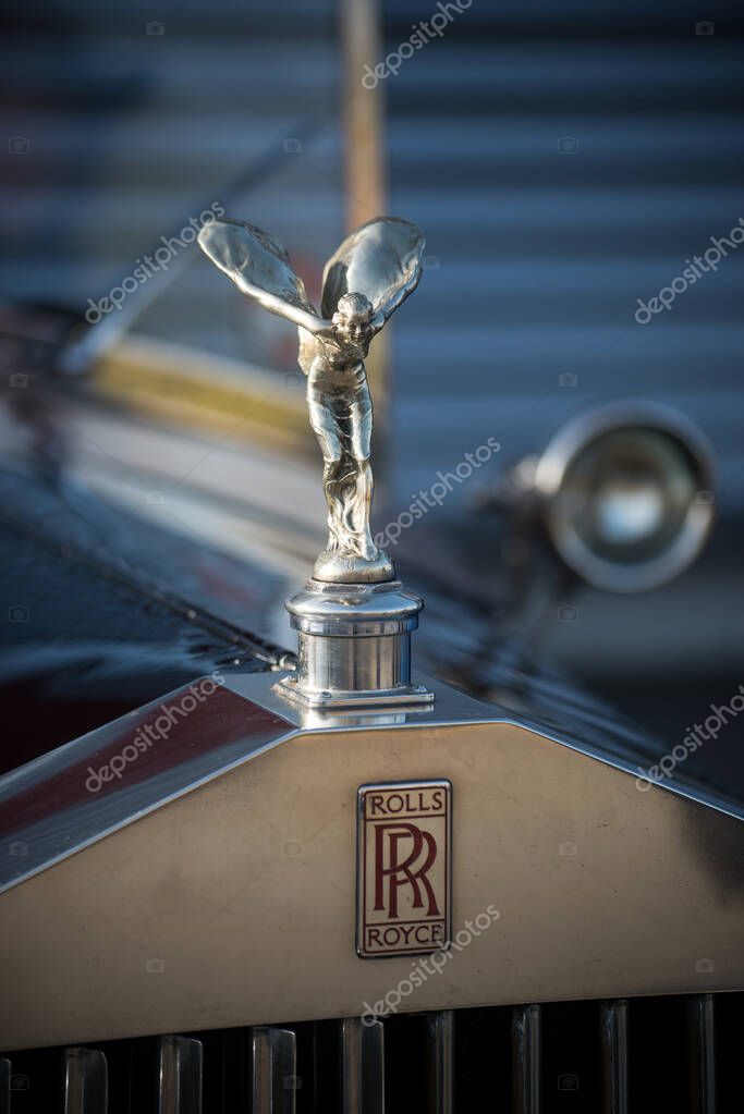 Mulhouse - France - 9 October 2022 - closeup of Rolls Royce logo on front car parked in the street