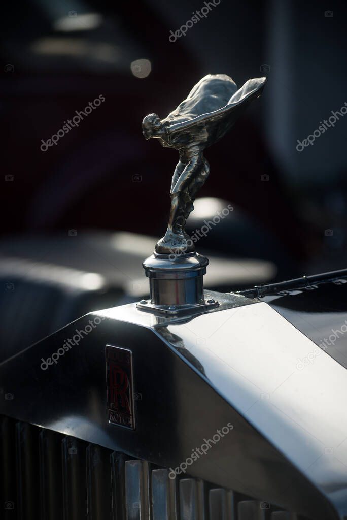 Mulhouse - France - 9 October 2022 - closeup of Rolls Royce logo on front car parked in the street