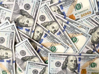 Yüz dolarlık banknotların geçmişi. Yüz dolarlık banknotların dokusu. Bir sürü dolar.