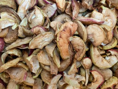 Kurutulmuş elmaların yakın plan çekimleri. Kurumuş elma dokusu