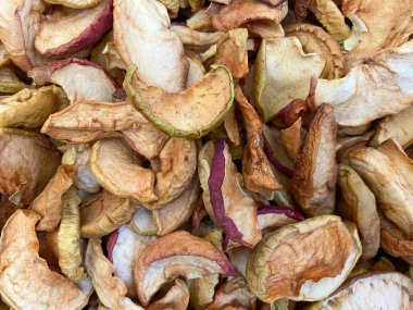 Kurutulmuş elmaların yakın plan çekimleri. Kurumuş elma dokusu