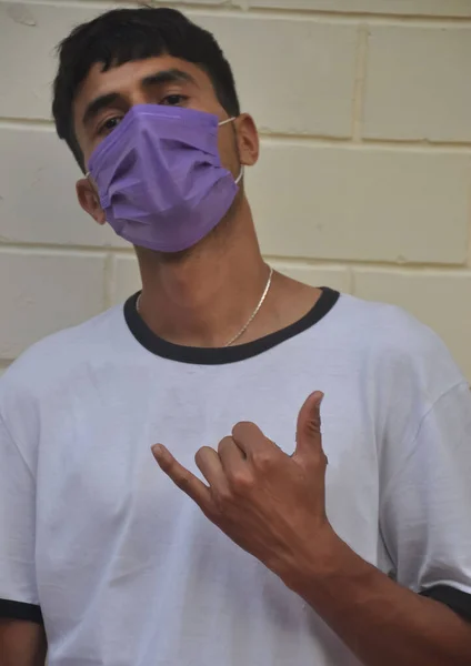Young Guy Making Shaka Sign His Hand Wearing Face Mask — Foto Stock